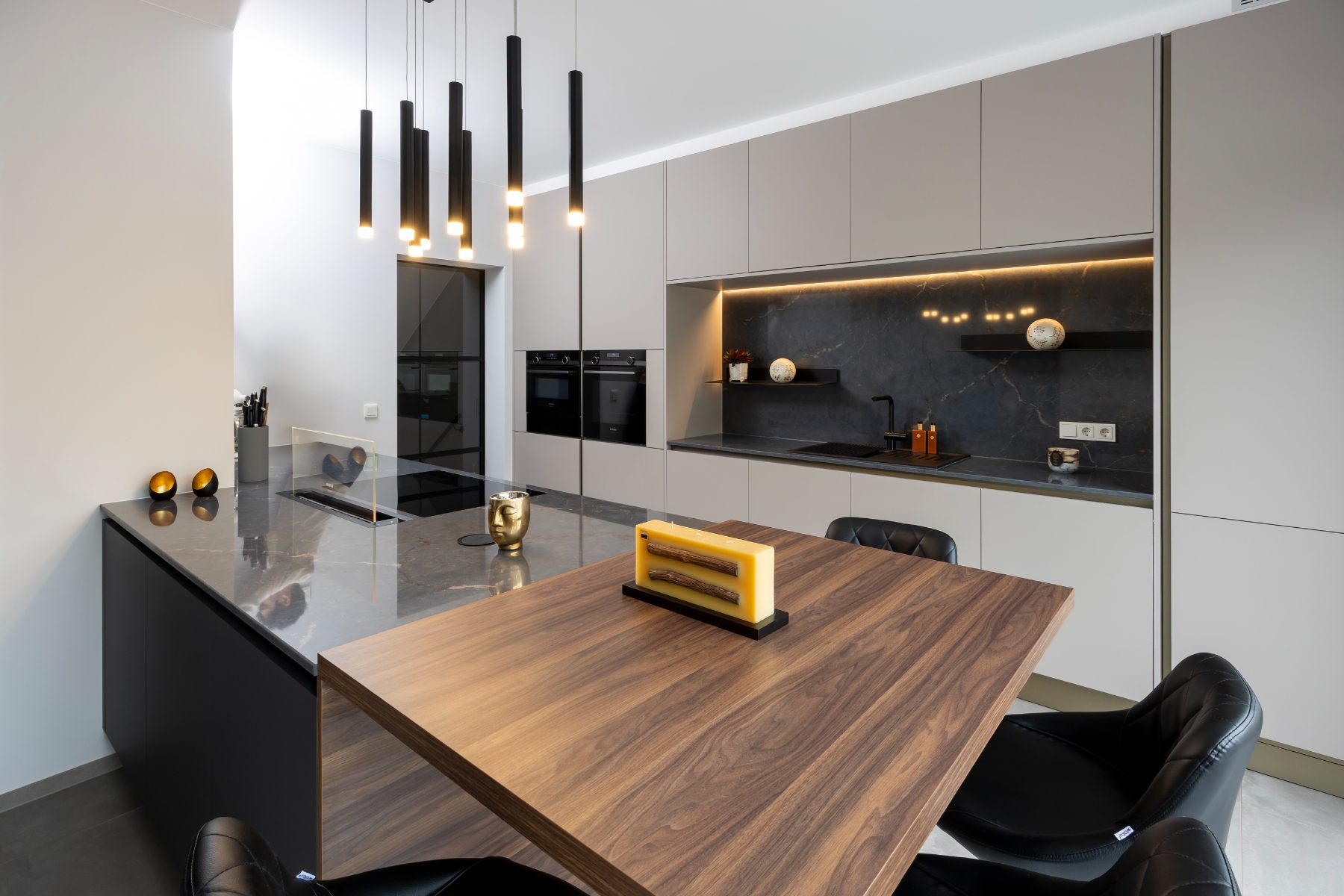 Walnut table integrated into the island